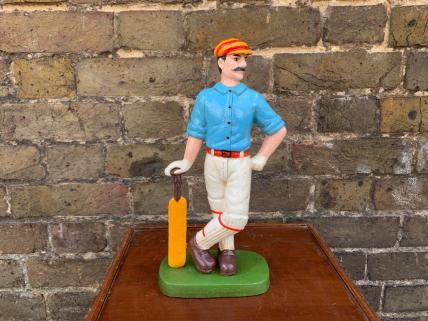 Cricketer doorstop